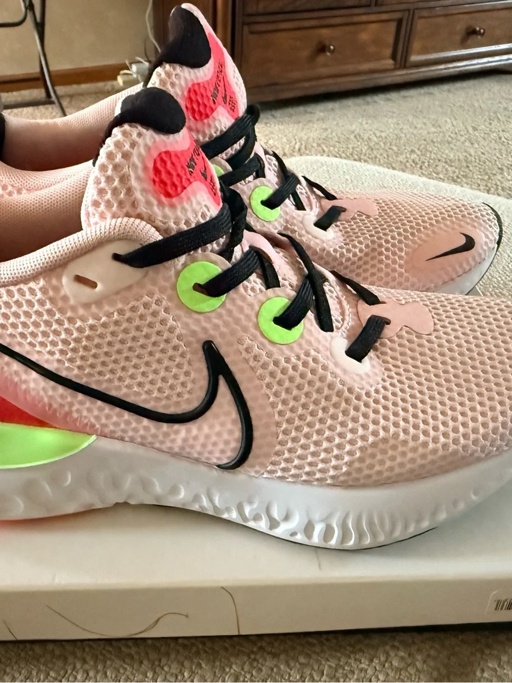Nike Pink Mesh Running Shoe with Neon Green and Black Details